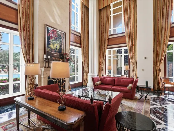 a bathroom with a glass shower door and a mirror
