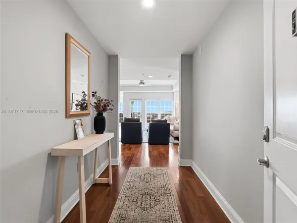 a kitchen with a sink cabinets and stainless steel appliances