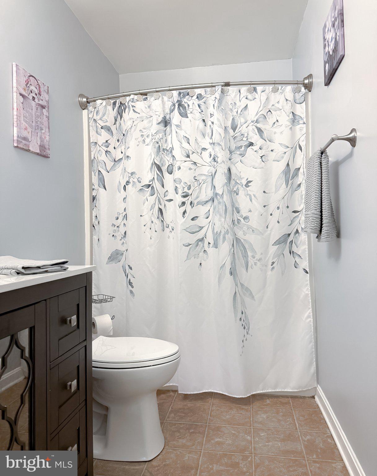 6020 Port Tobacco Road Indian Head, MD 20640 - Photo 33 of 59 Serene bathroom with floral accents.