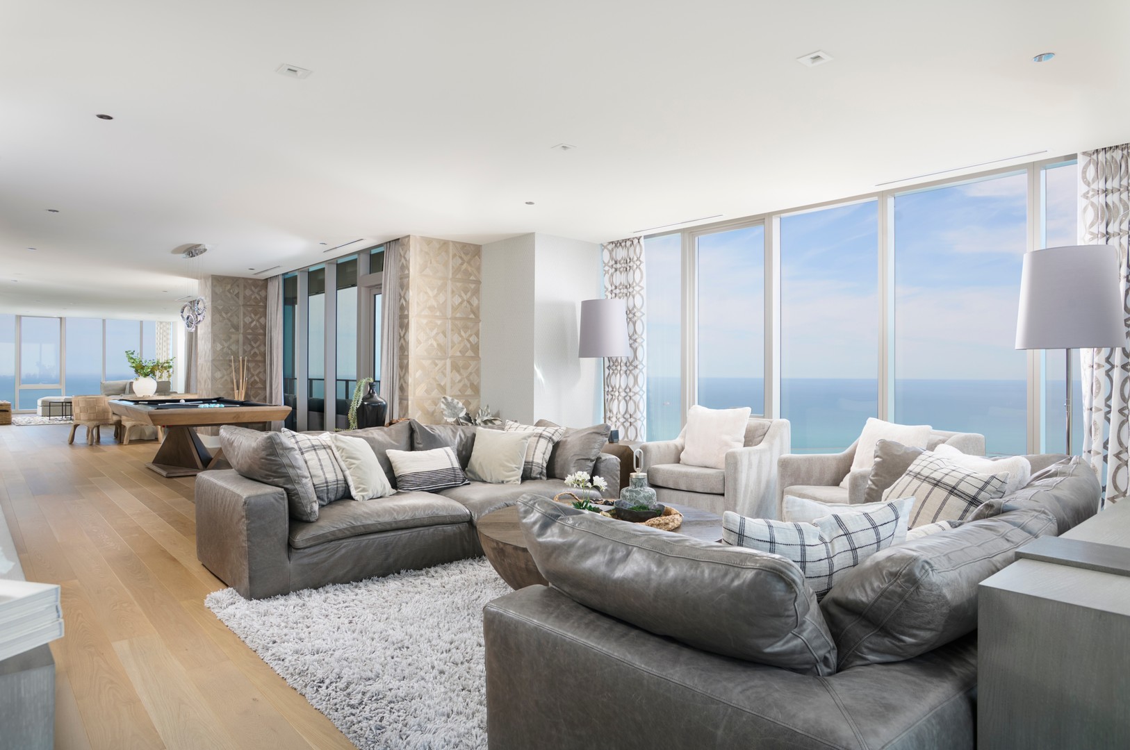 363 East Wacker Drive, Unit 6106 Chicago, IL 60601 - Photo 12 of 48 a living room with furniture and a large window