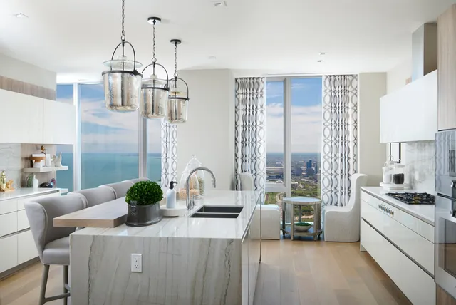 a kitchen with counter top space and stainless steel appliances
