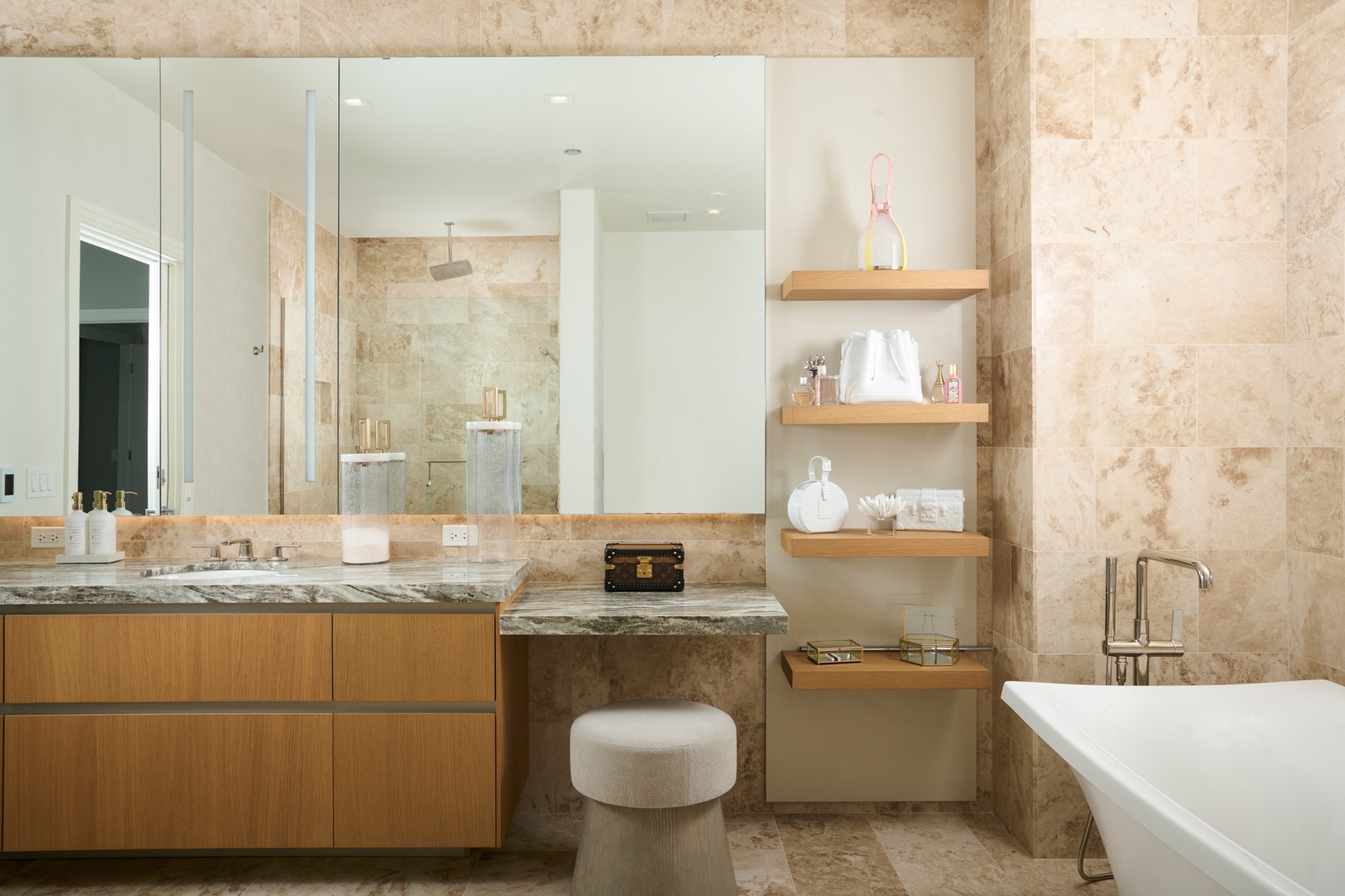 363 East Wacker Drive, Unit 6106 Chicago, IL 60601 - Photo 21 of 48 a bathroom with a granite countertop sink mirror vanity and toilet