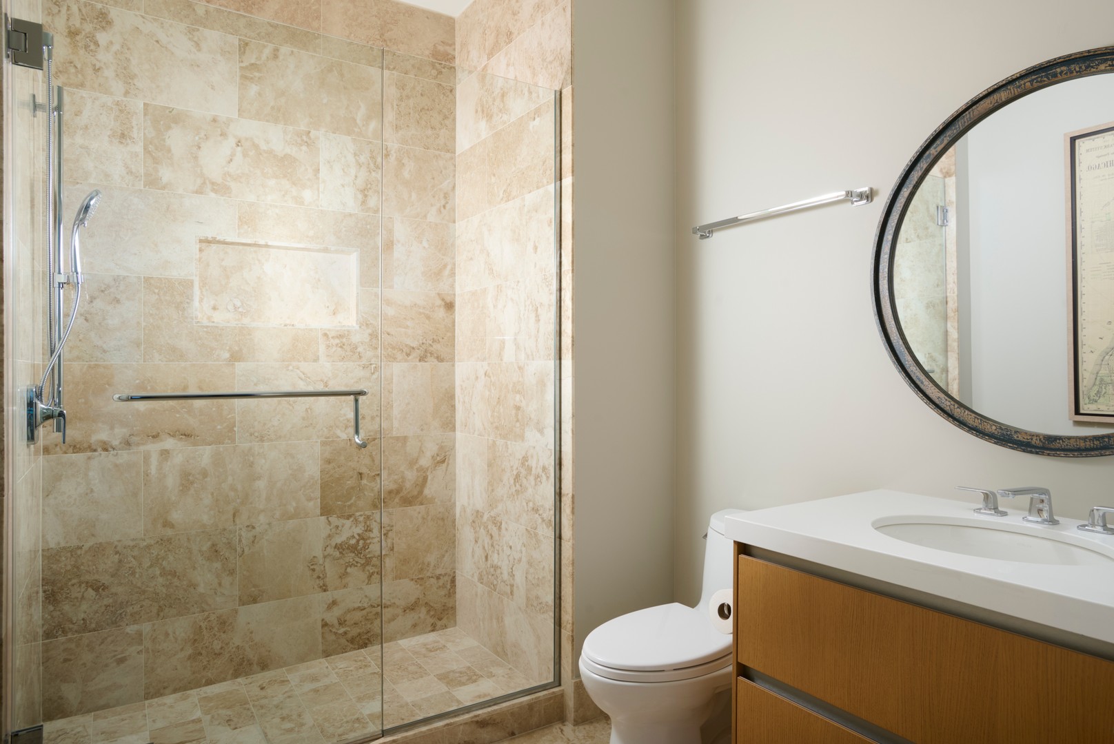 363 East Wacker Drive, Unit 6106 Chicago, IL 60601 - Photo 28 of 48 a bathroom with a granite countertop sink toilet and shower