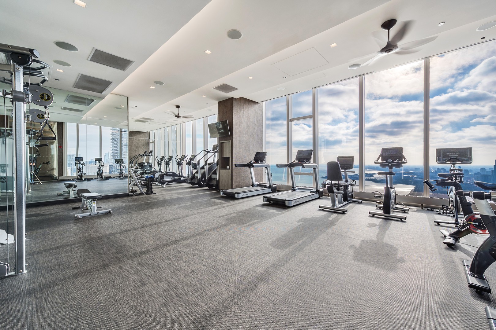 363 East Wacker Drive, Unit 6106 Chicago, IL 60601 - Photo 37 of 48 a view of a room with gym equipment