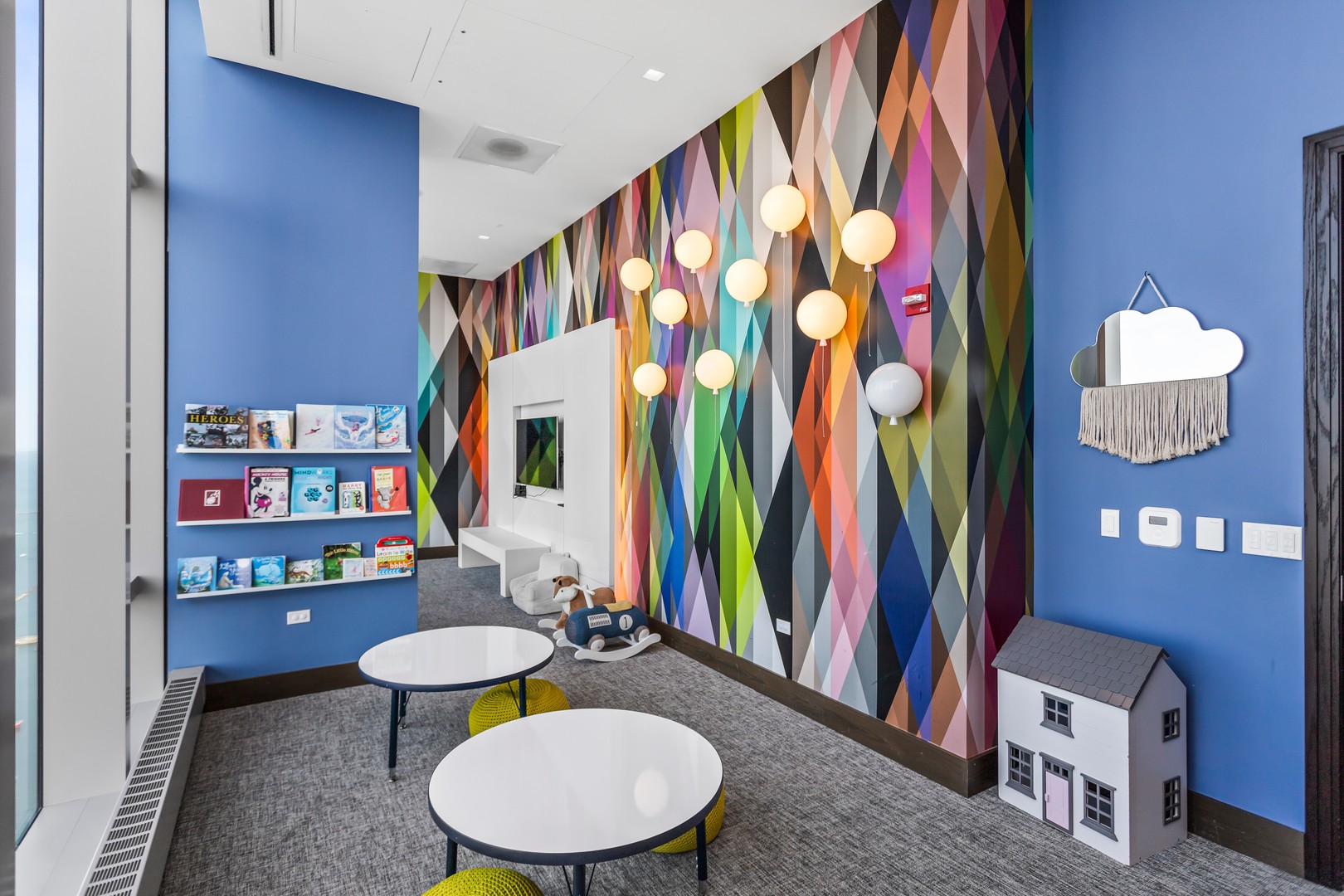 363 East Wacker Drive, Unit 6106 Chicago, IL 60601 - Photo 46 of 48 a bathroom with stainless steel appliances a sink and a large mirror