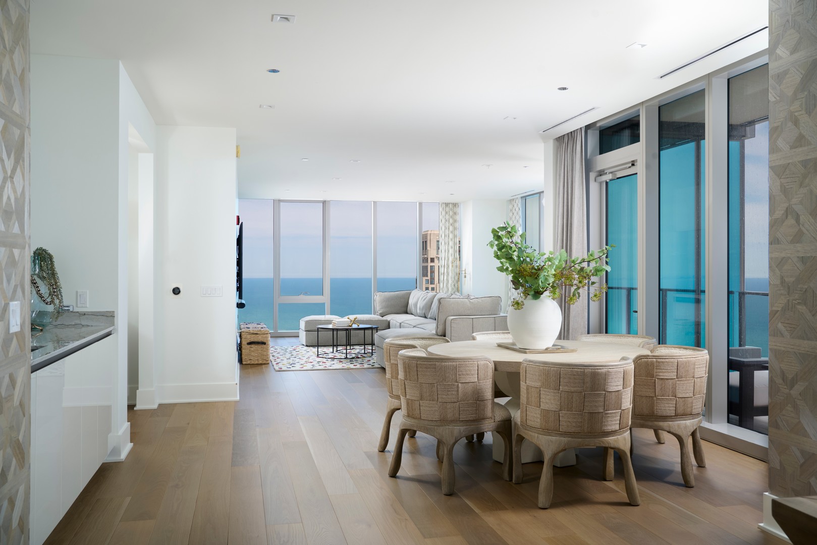 363 East Wacker Drive, Unit 6106 Chicago, IL 60601 - Photo 6 of 48 a view of a dining room with furniture and window