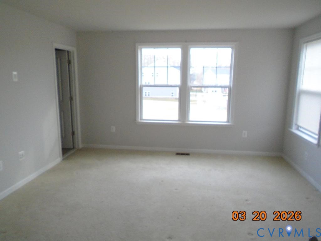 645 Rivanna Hill Road Glen Allen, VA 23060 - Photo 13 of 25 Spare room with light colored carpet and baseboard