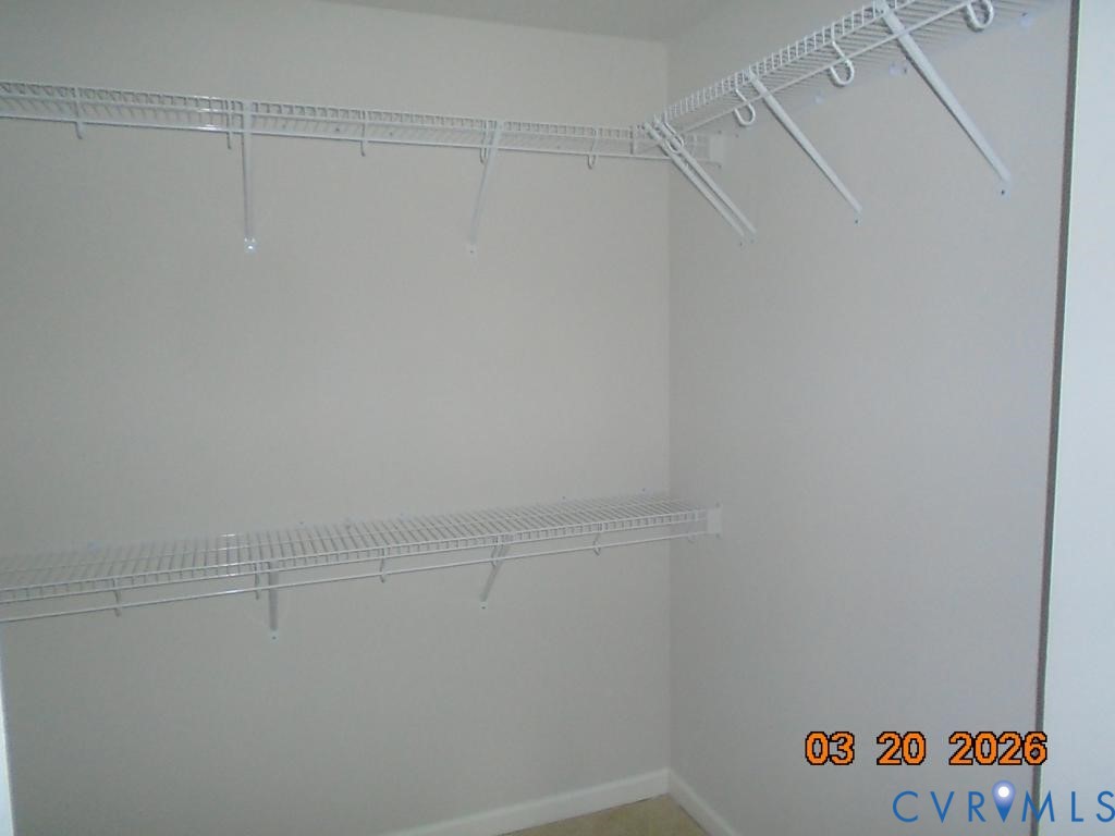 645 Rivanna Hill Road Glen Allen, VA 23060 - Photo 16 of 25 Walk in closet with light colored carpet