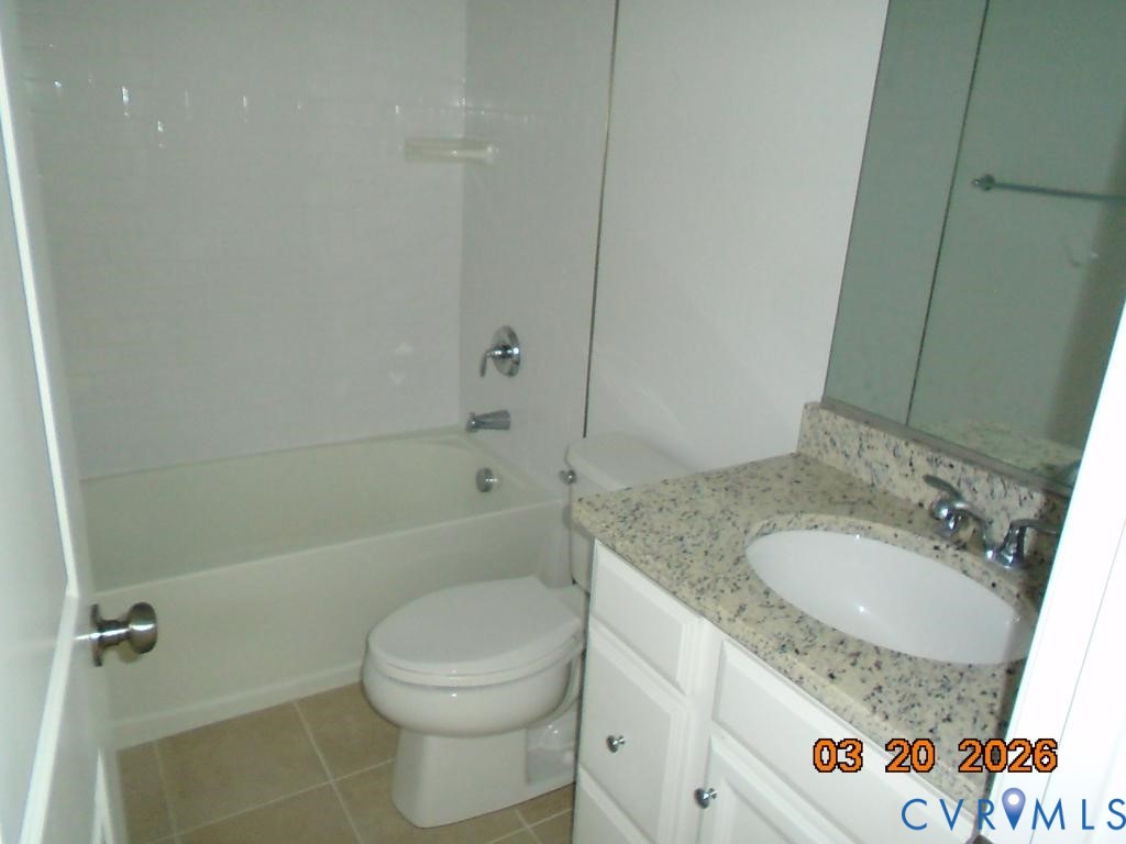 645 Rivanna Hill Road Glen Allen, VA 23060 - Photo 17 of 25 Bathroom featuring vanity, light tile patterned fl