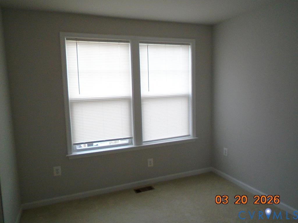 645 Rivanna Hill Road Glen Allen, VA 23060 - Photo 18 of 25 Empty room featuring healthy amount of natural lig