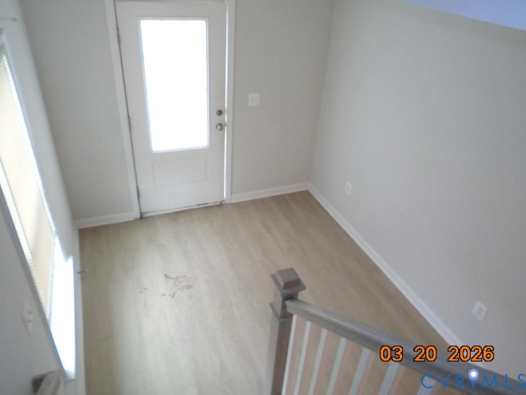 645 Rivanna Hill Road Glen Allen, VA 23060 - Photo 24 of 25 Entryway with light wood-style floors and baseboar