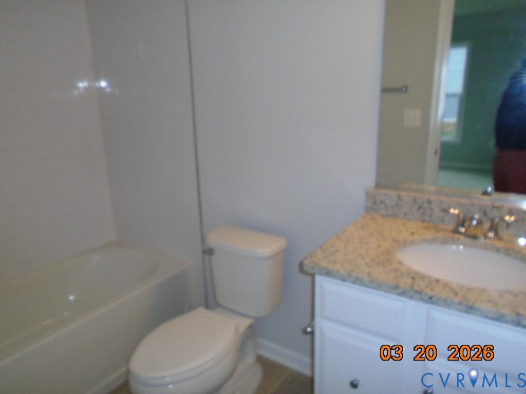 645 Rivanna Hill Road Glen Allen, VA 23060 - Photo 5 of 25 Bathroom with vanity and toilet