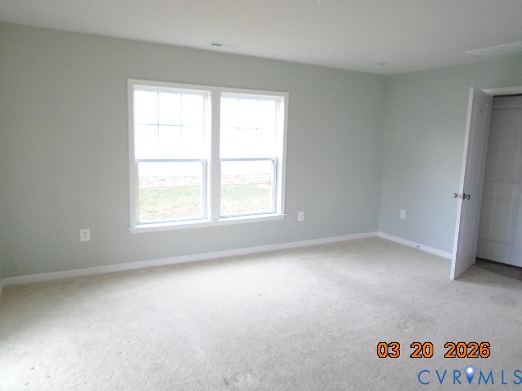 645 Rivanna Hill Road Glen Allen, VA 23060 - Photo 7 of 25 Unfurnished bedroom featuring light carpet and bas