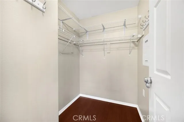a spacious bathroom with a granite countertop sink toilet and shower