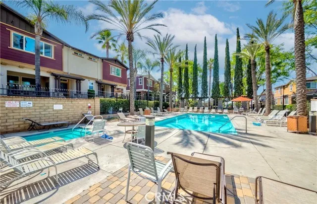 a view of a patio with swimming pool