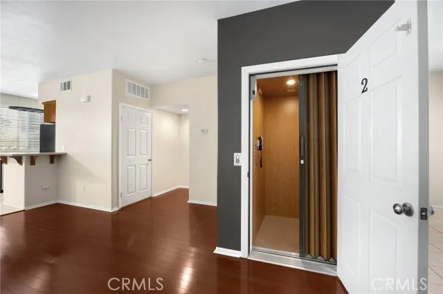 a view of a bathroom with a glass door