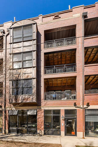 a front view of a building with a glass door