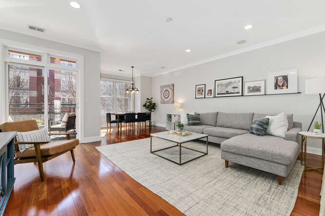 2118 West Rice Street, Unit 2 Chicago, IL 60622 - Photo 2 of 22 a living room with furniture and a large window