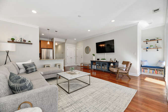 2118 West Rice Street, Unit 2 Chicago, IL 60622 - Photo 3 of 22 a living room with furniture and a flat screen tv