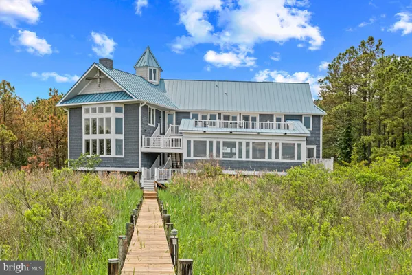 an aerial view of a house roof deck