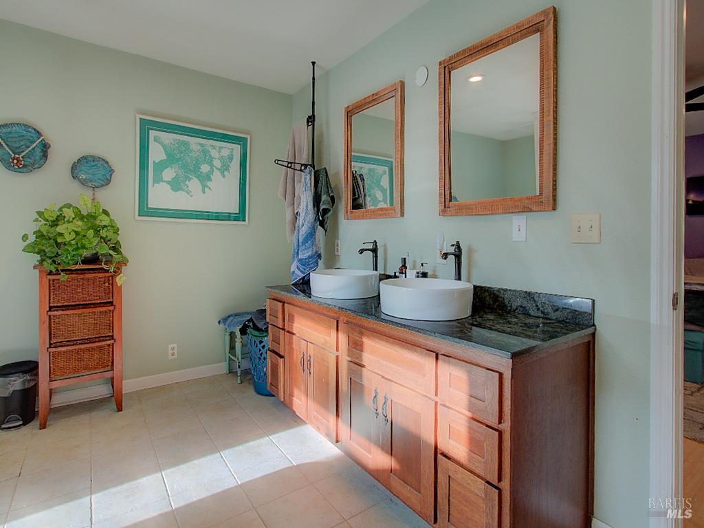 31191 Turner Road Fort Bragg, CA 95437 - Photo 19 of 36 a kitchen with stainless steel appliances granite countertop a sink stove and cabinets