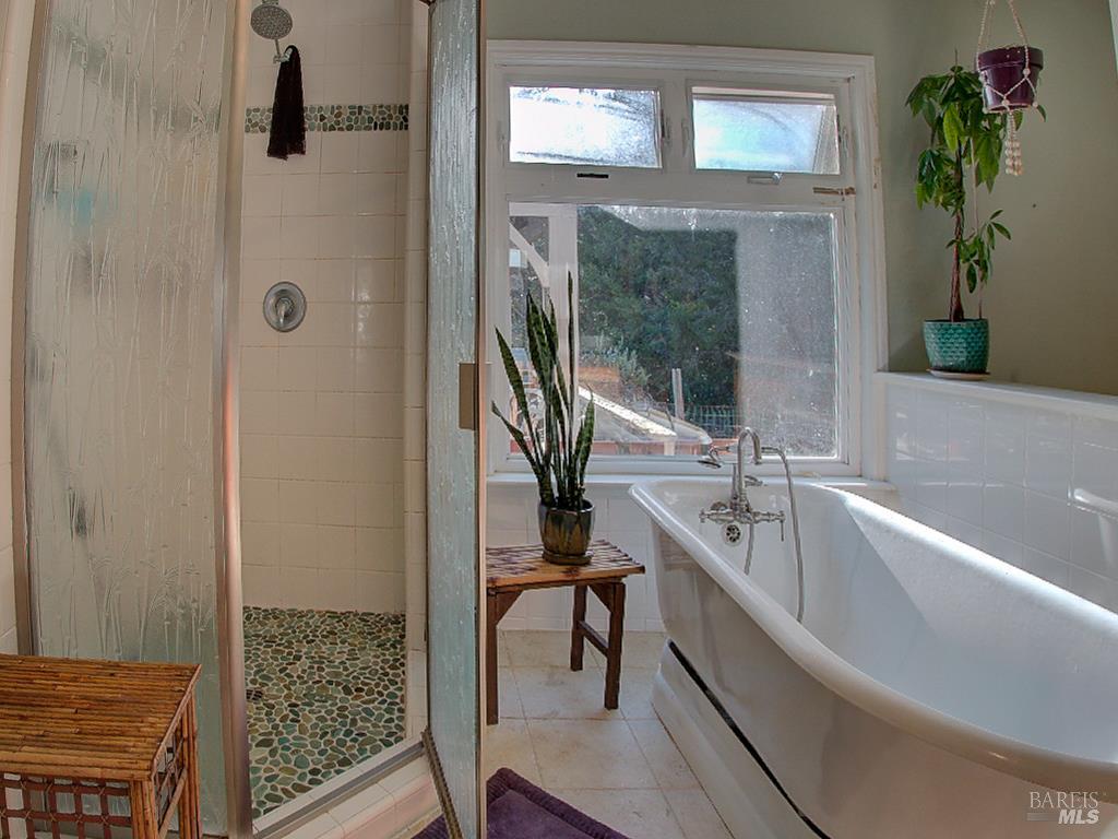 31191 Turner Road Fort Bragg, CA 95437 - Photo 21 of 36 a bathroom with a tub sink and mirror