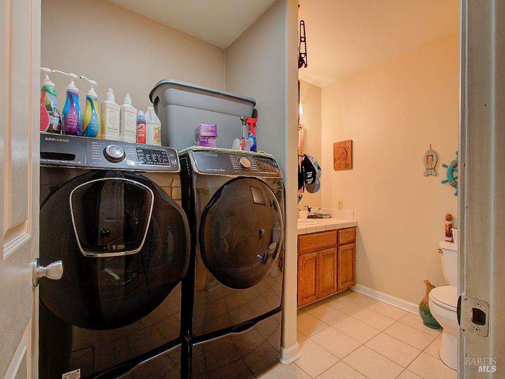 31191 Turner Road Fort Bragg, CA 95437 - Photo 24 of 36 a utility room with dryer and washer