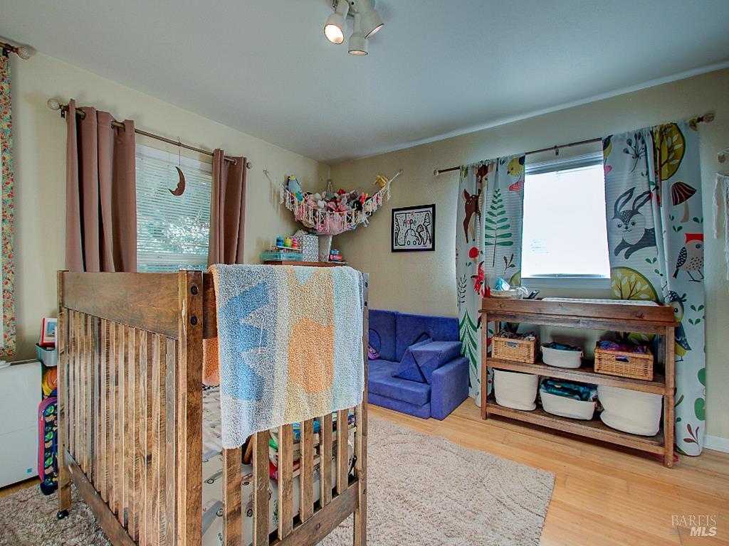31191 Turner Road Fort Bragg, CA 95437 - Photo 25 of 36 a bedroom with furniture and a window