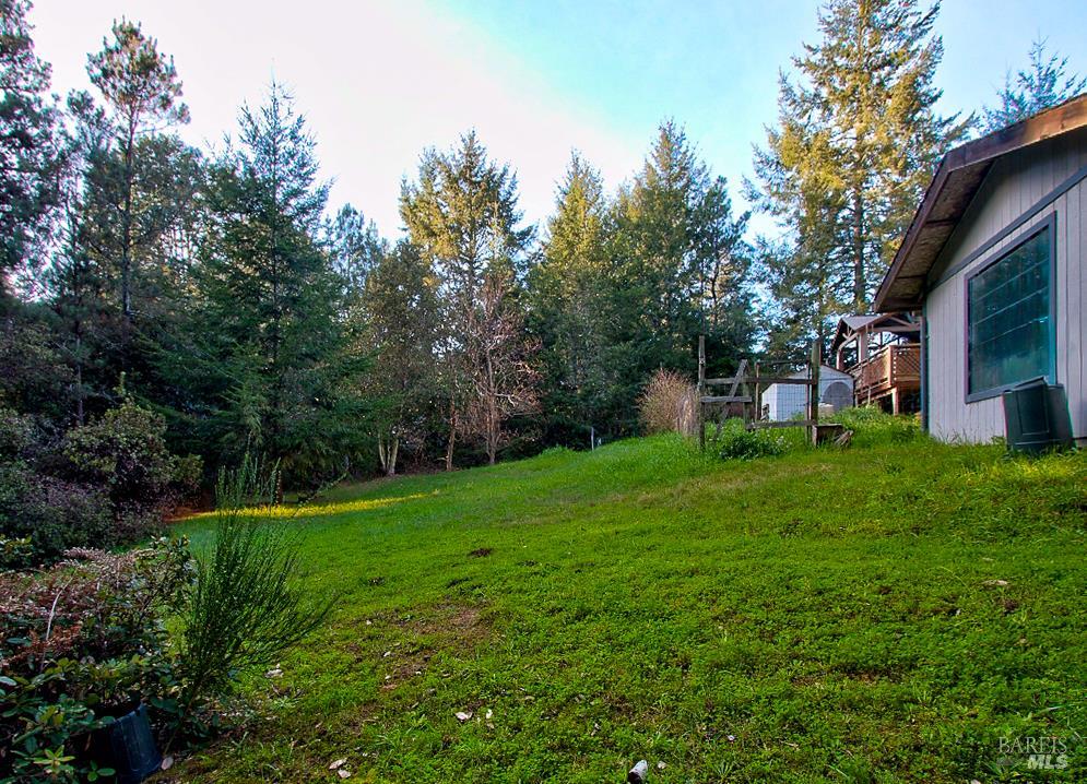 31191 Turner Road Fort Bragg, CA 95437 - Photo 34 of 36 a view of a house with backyard and sitting area