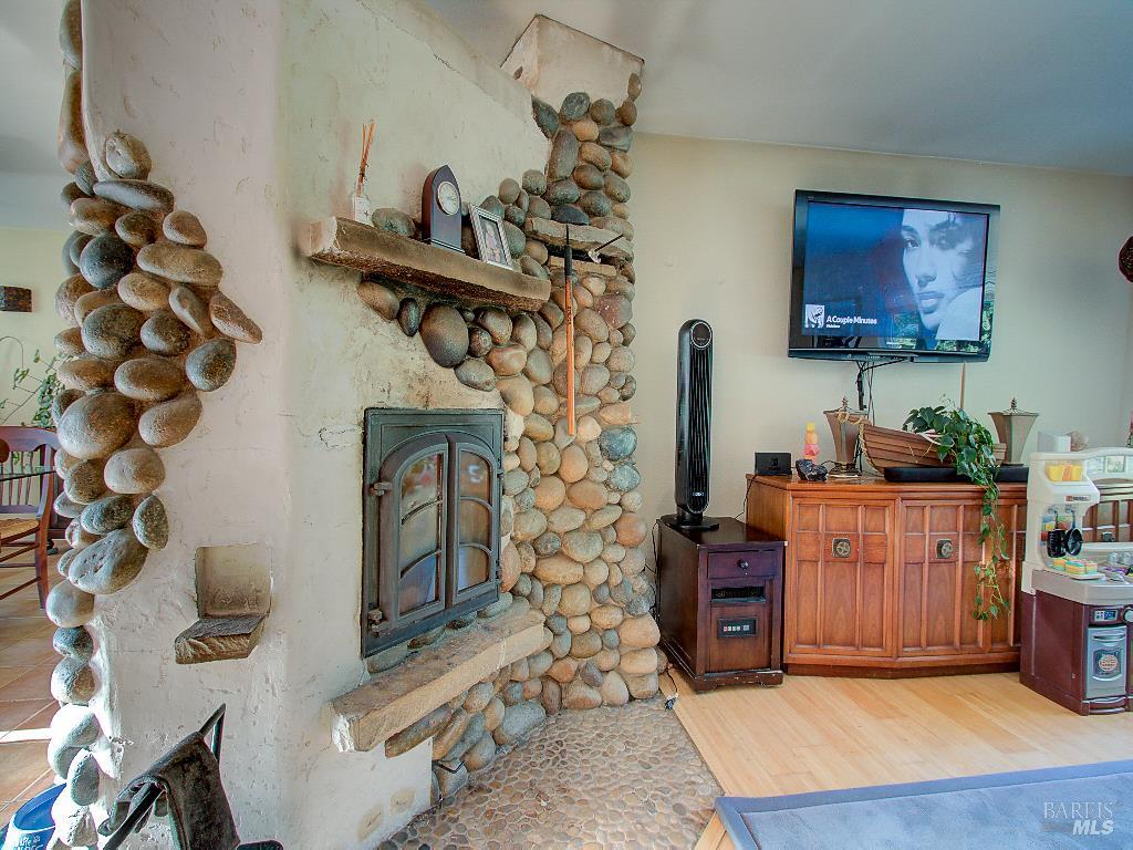 31191 Turner Road Fort Bragg, CA 95437 - Photo 4 of 36 a kitchen with stainless steel appliances granite countertop a stove a sink and a microwave