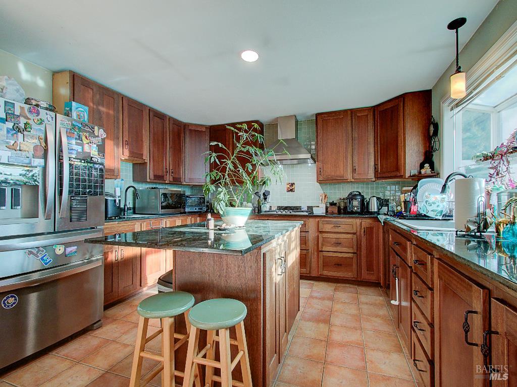 31191 Turner Road Fort Bragg, CA 95437 - Photo 6 of 36 a kitchen with stainless steel appliances granite countertop a sink and cabinets