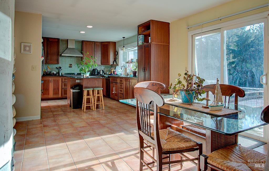31191 Turner Road Fort Bragg, CA 95437 - Photo 7 of 36 a dining room filled with furniture and a potted plant