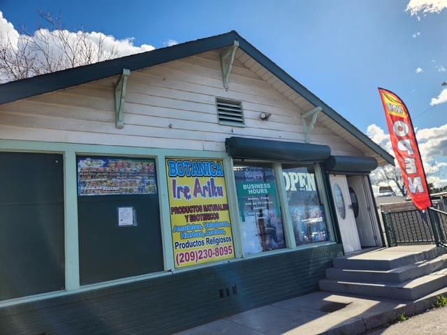 1902 East Harding Way Stockton, CA 95205 - Photo 3 of 6 a front view of a house with entryway