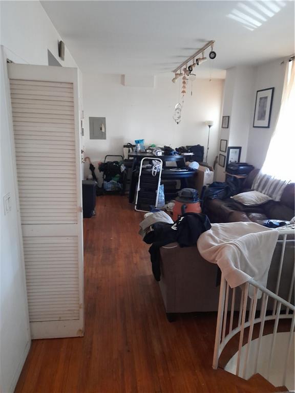 4050 Nostrand Avenue, Unit 1F Brooklyn, NY 11235 - Photo 6 of 9 a living room with furniture and wooden floor