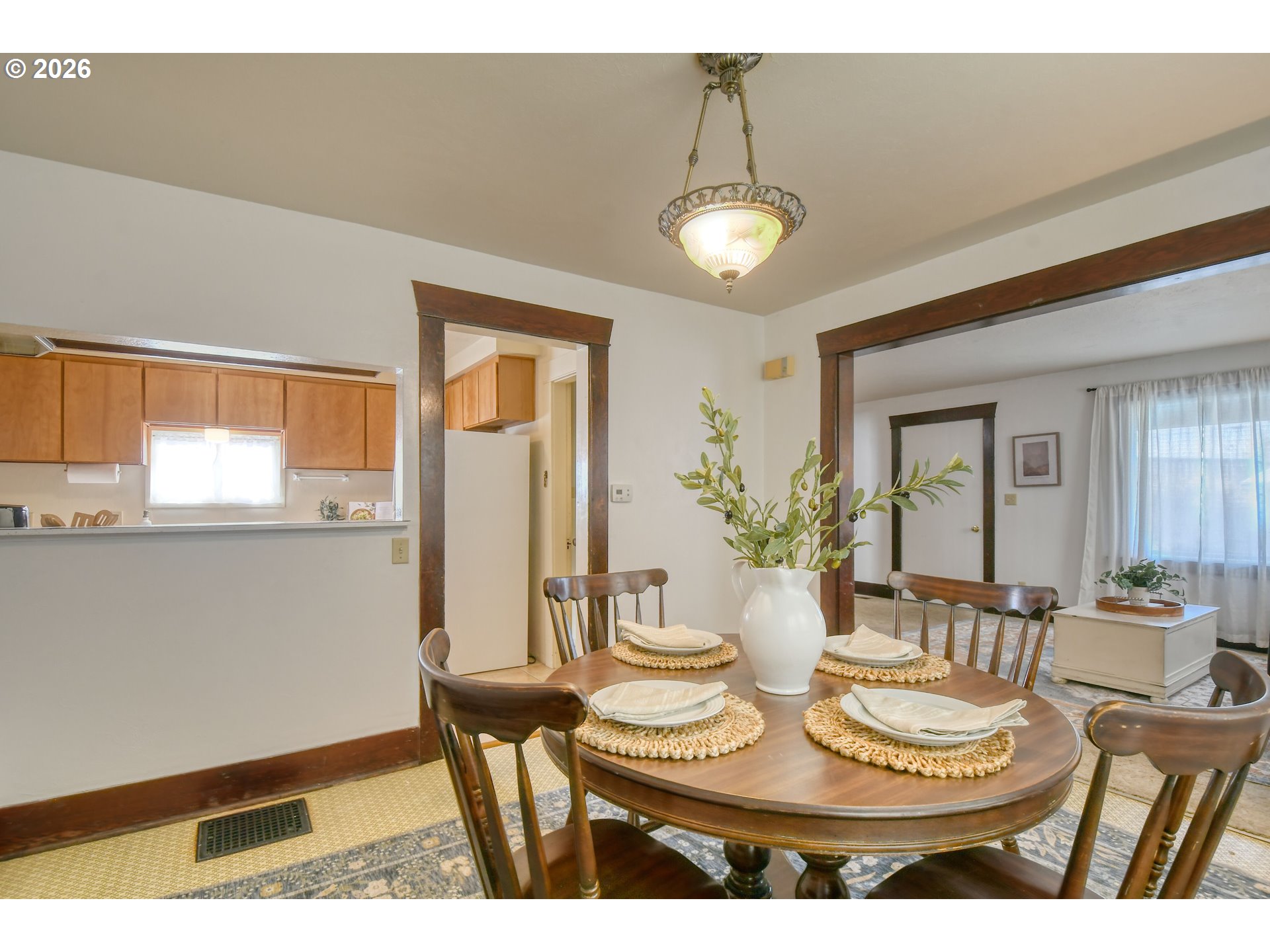 120 Southeast 7th Street Pendleton, OR 97801 - Photo 11 of 35 a view of a dining room with furniture and wooden floor