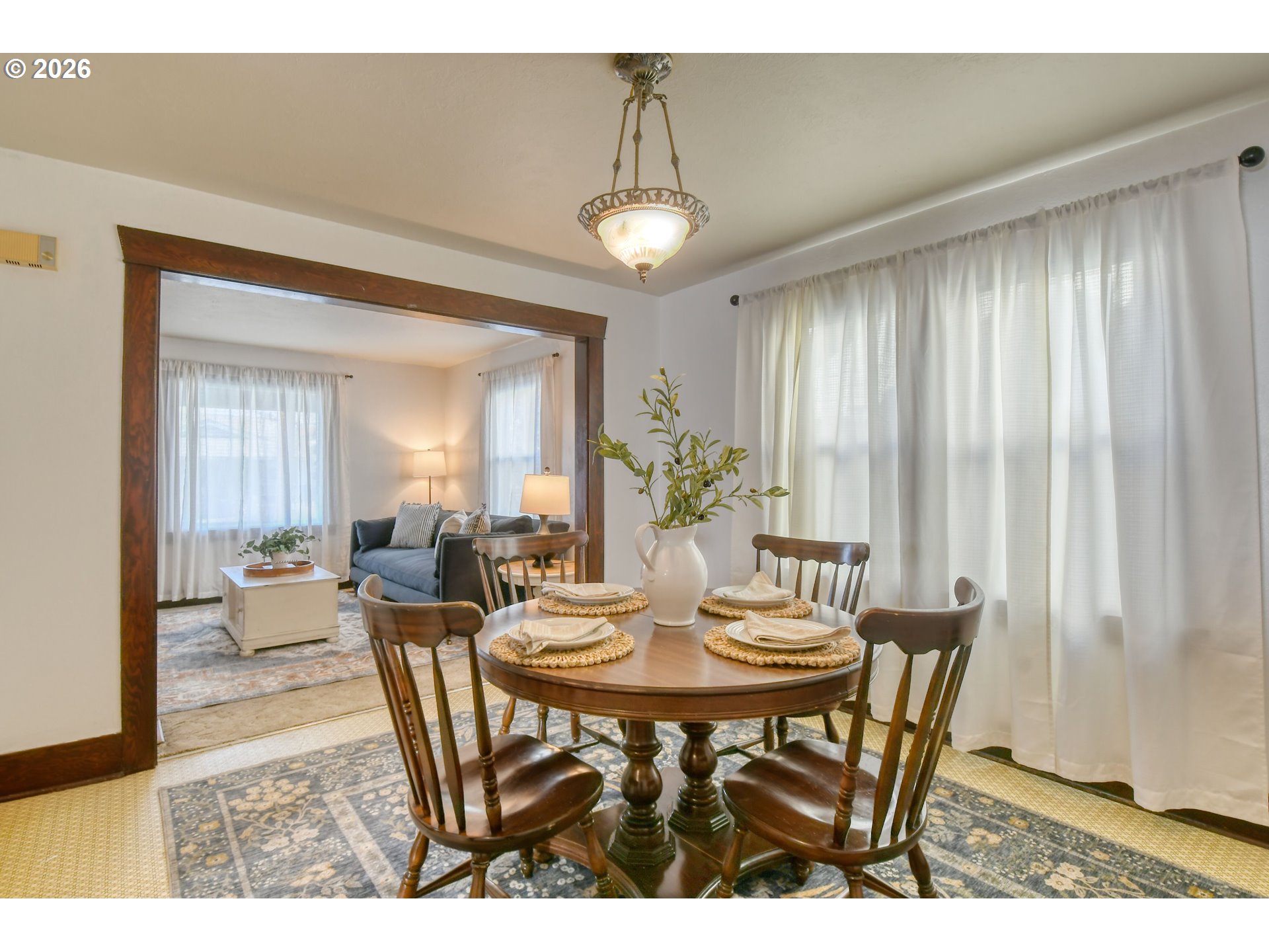 120 Southeast 7th Street Pendleton, OR 97801 - Photo 10 of 35 a view of a dining room with furniture and chandelier