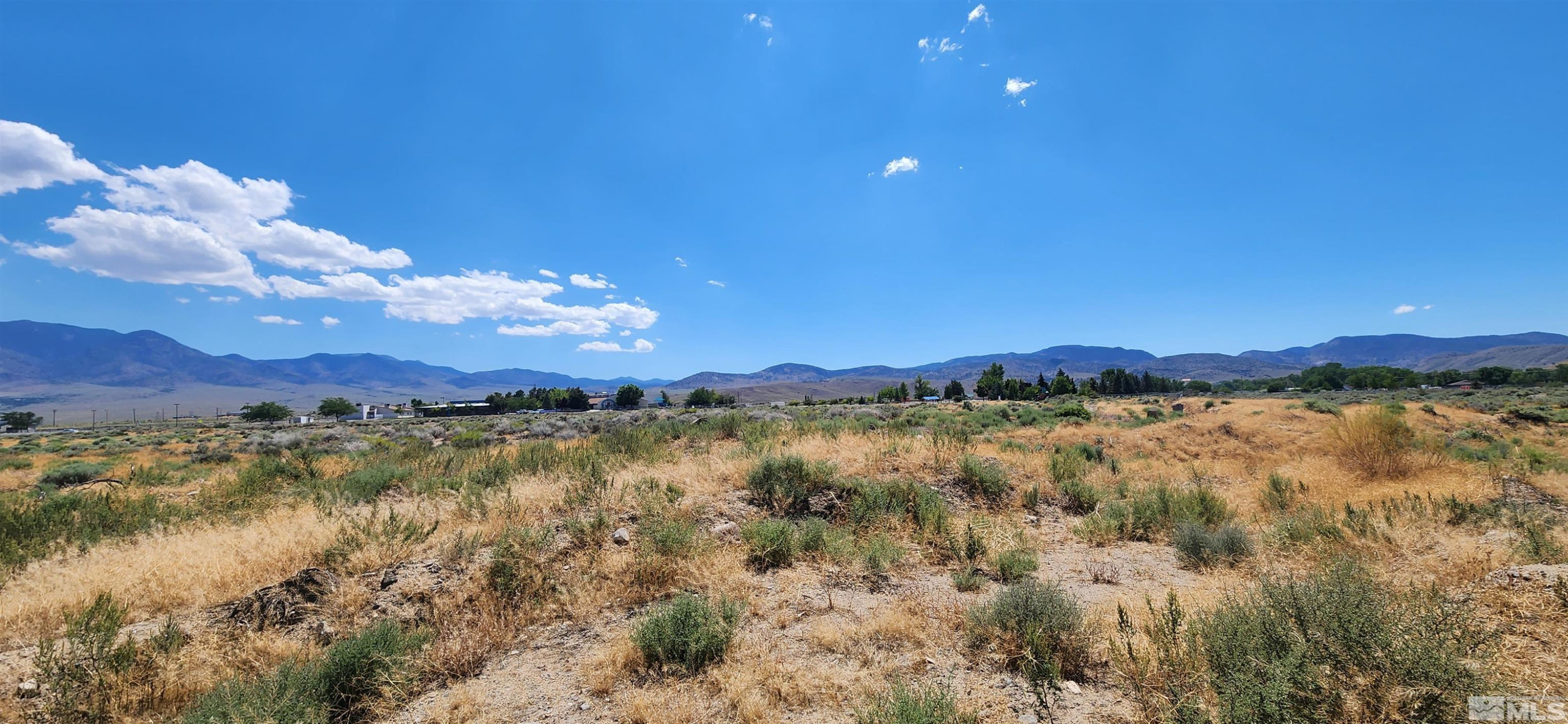 2968239 Dayton Valley Road Dayton, NV 89403 - Photo 9 of 17 a view of a lake with sunset
