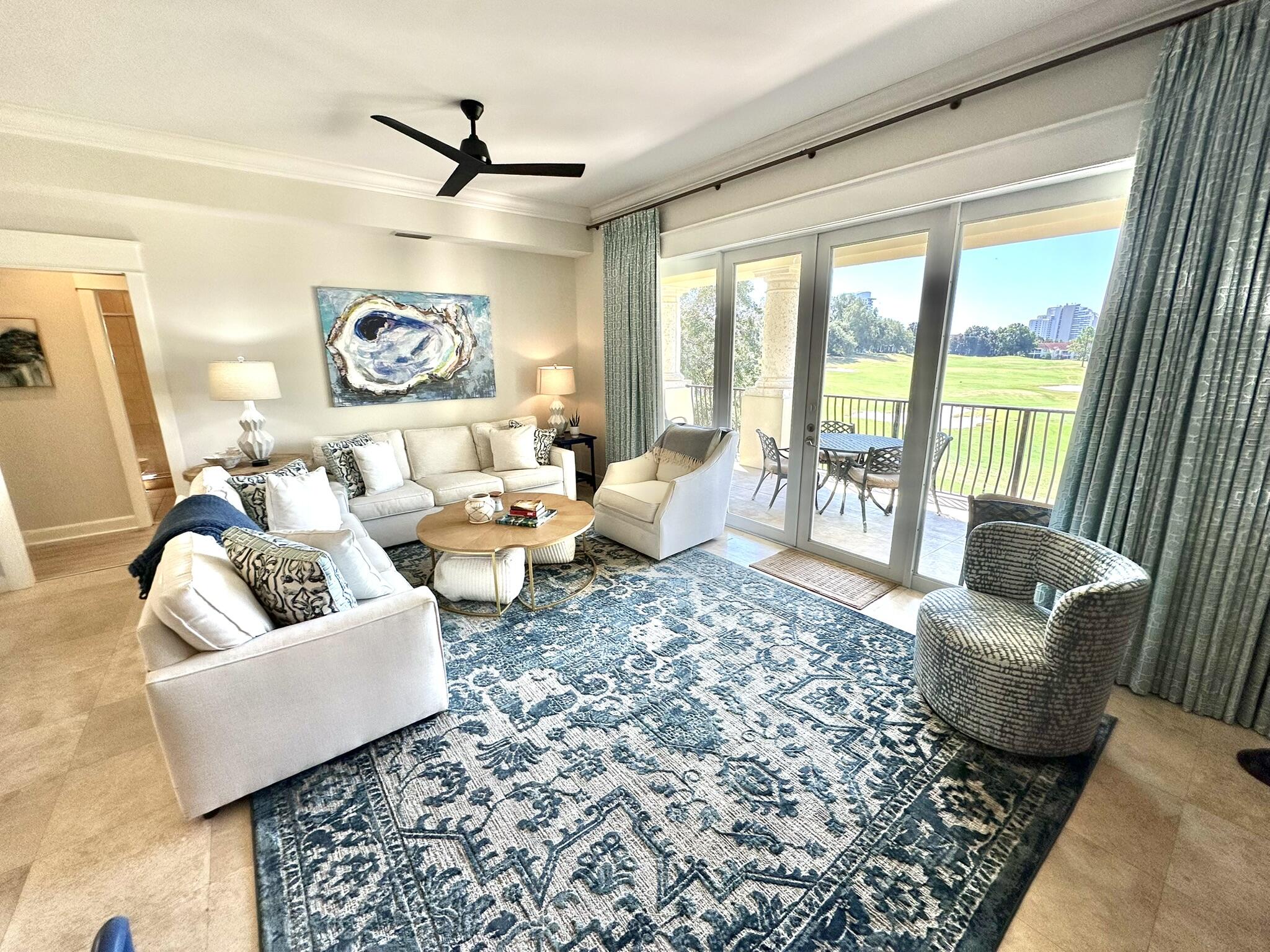 5353 Pine Ridge Lane, Unit 5353 Miramar Beach, FL 32550 - Photo 16 of 62 a living room with furniture and a large window