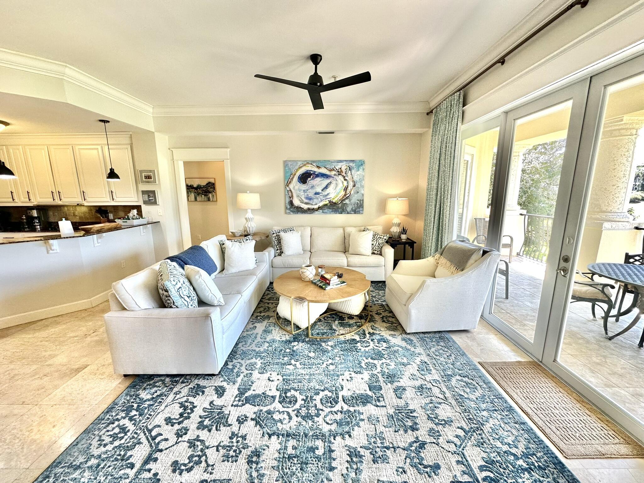 5353 Pine Ridge Lane, Unit 5353 Miramar Beach, FL 32550 - Photo 17 of 62 a living room with furniture and a large window
