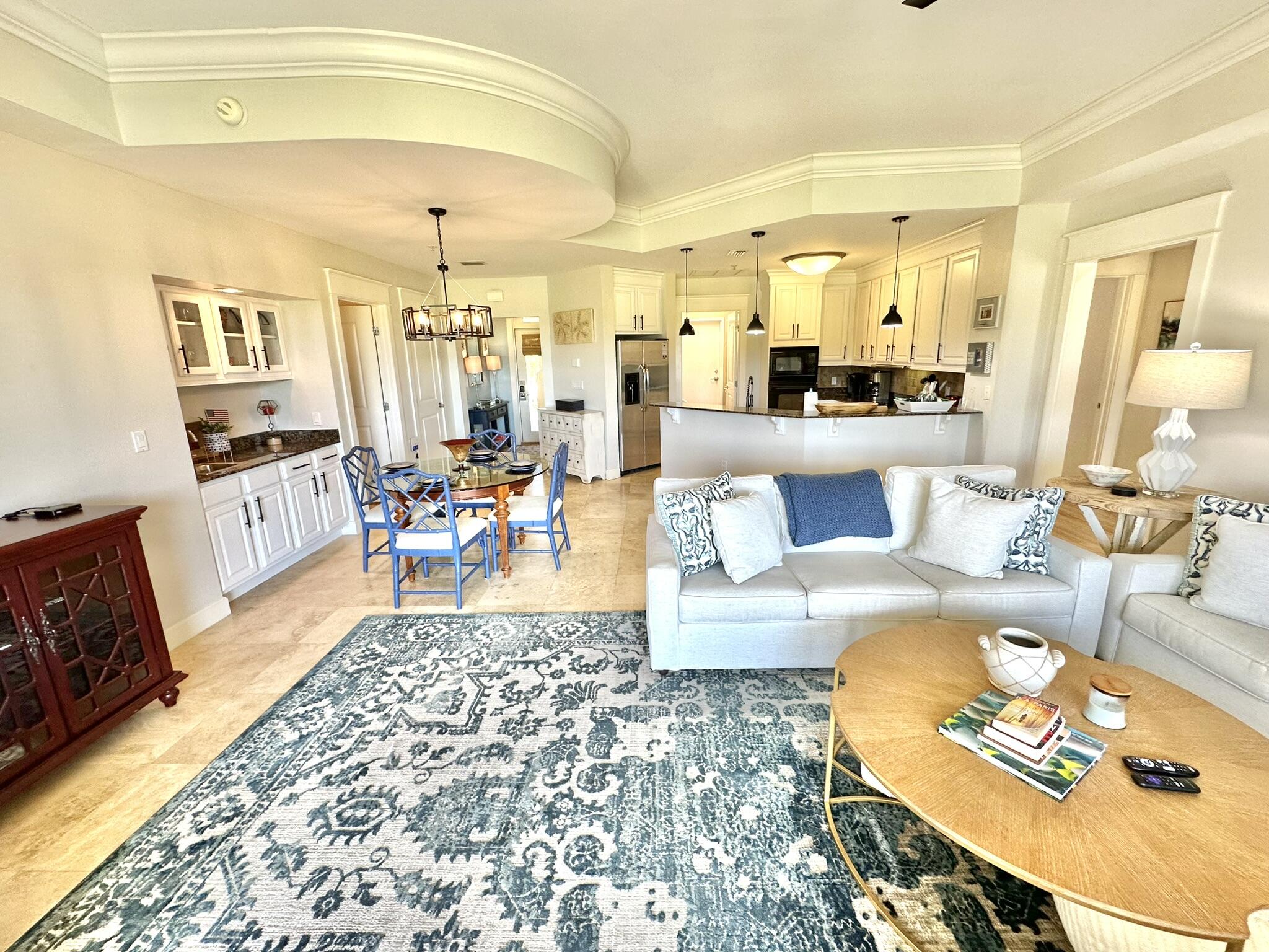 5353 Pine Ridge Lane, Unit 5353 Miramar Beach, FL 32550 - Photo 19 of 62 a living room with furniture and a dining table
