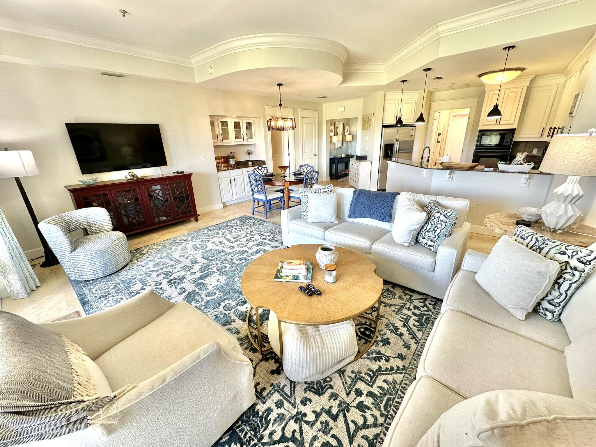 5353 Pine Ridge Lane, Unit 5353 Miramar Beach, FL 32550 - Photo 20 of 62 a living room with furniture and a flat screen tv