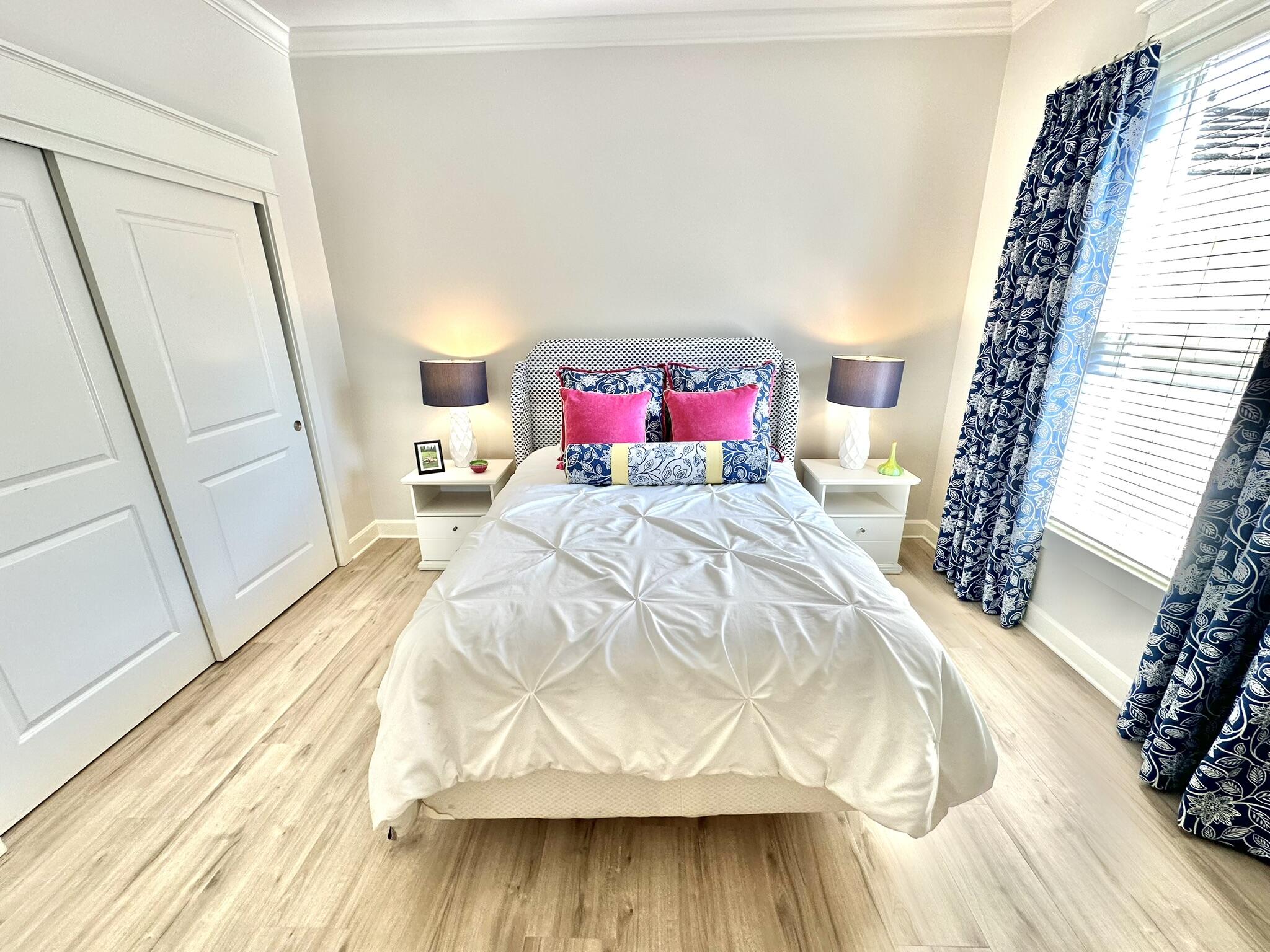 5353 Pine Ridge Lane, Unit 5353 Miramar Beach, FL 32550 - Photo 35 of 62 a bed sitting in a bedroom next to a window