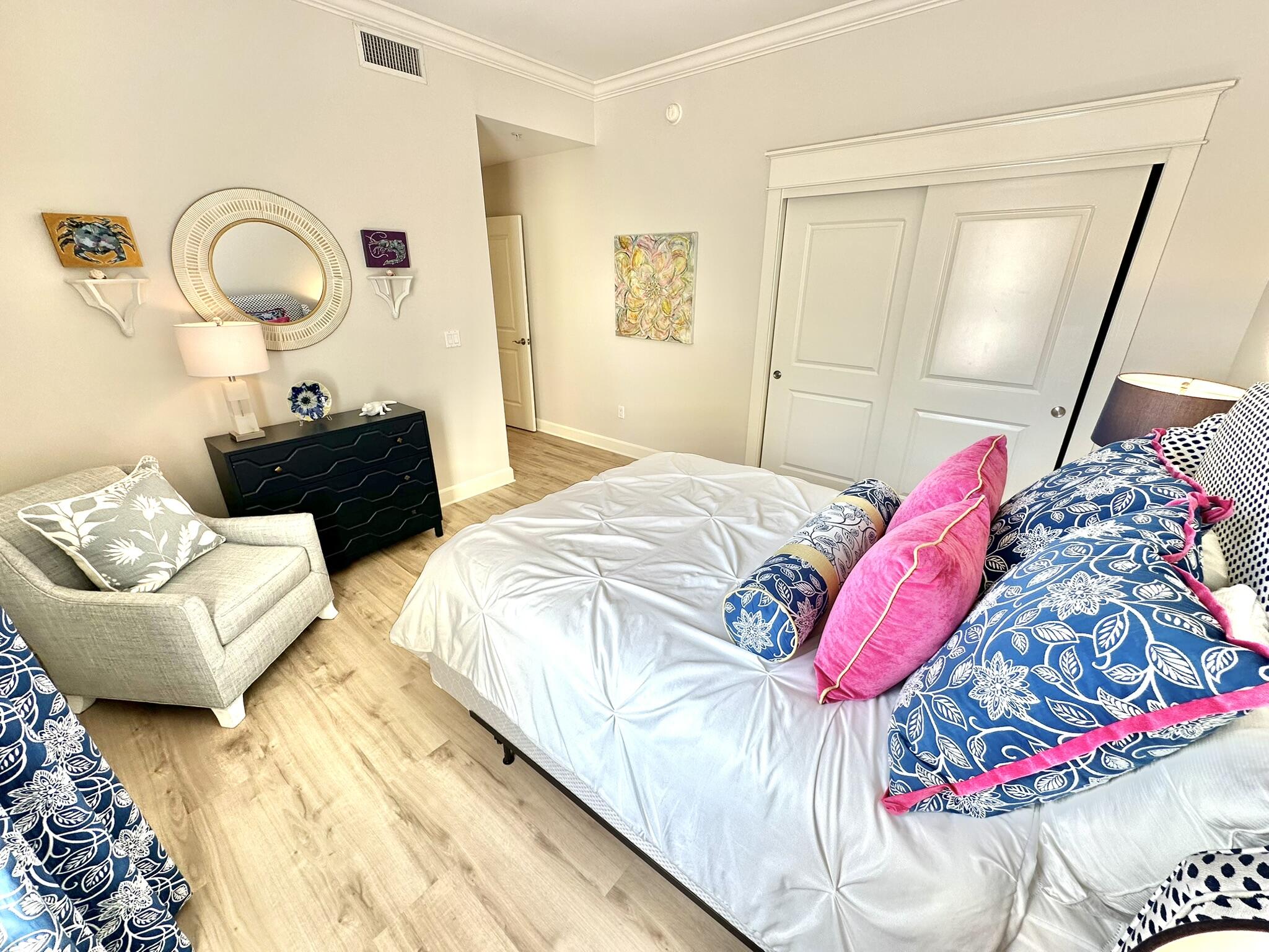 5353 Pine Ridge Lane, Unit 5353 Miramar Beach, FL 32550 - Photo 36 of 62 a bedroom with a bed and a mirror