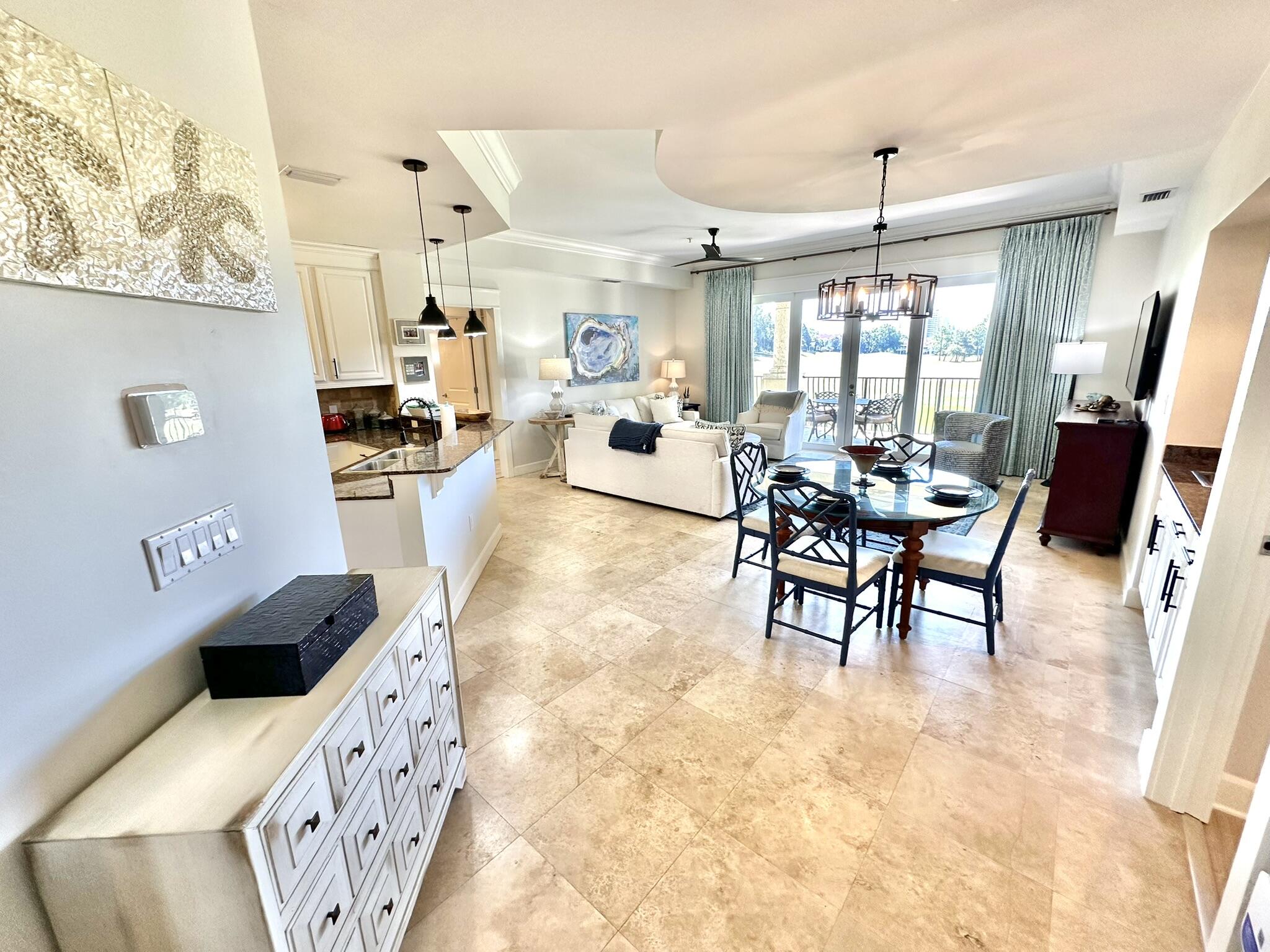 5353 Pine Ridge Lane, Unit 5353 Miramar Beach, FL 32550 - Photo 5 of 62 a living room with furniture and a flat screen tv