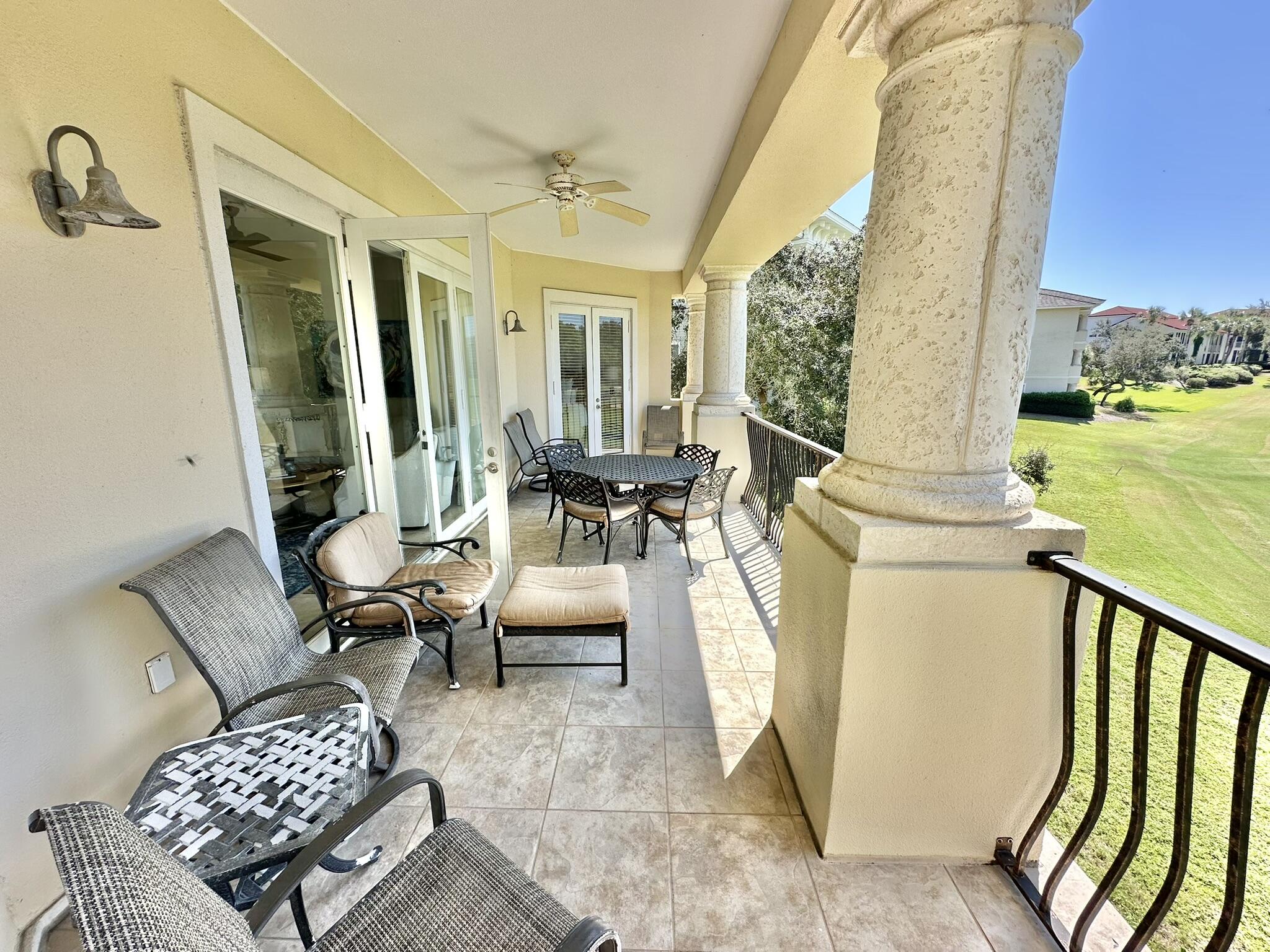 5353 Pine Ridge Lane, Unit 5353 Miramar Beach, FL 32550 - Photo 53 of 62 a living room with furniture and a floor to ceiling window