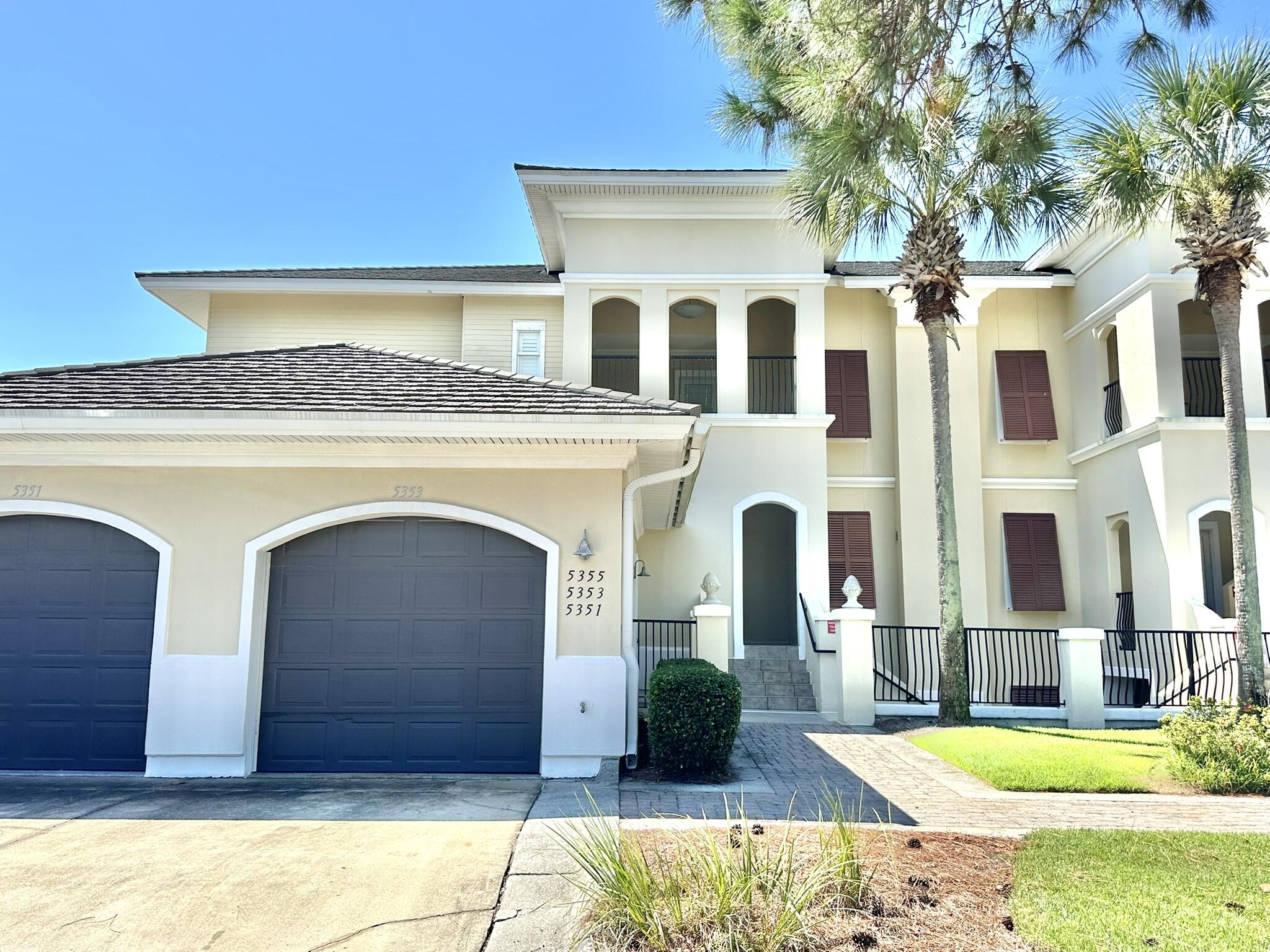 5353 Pine Ridge Lane, Unit 5353 Miramar Beach, FL 32550 - Photo 58 of 62 a front view of a house with yard