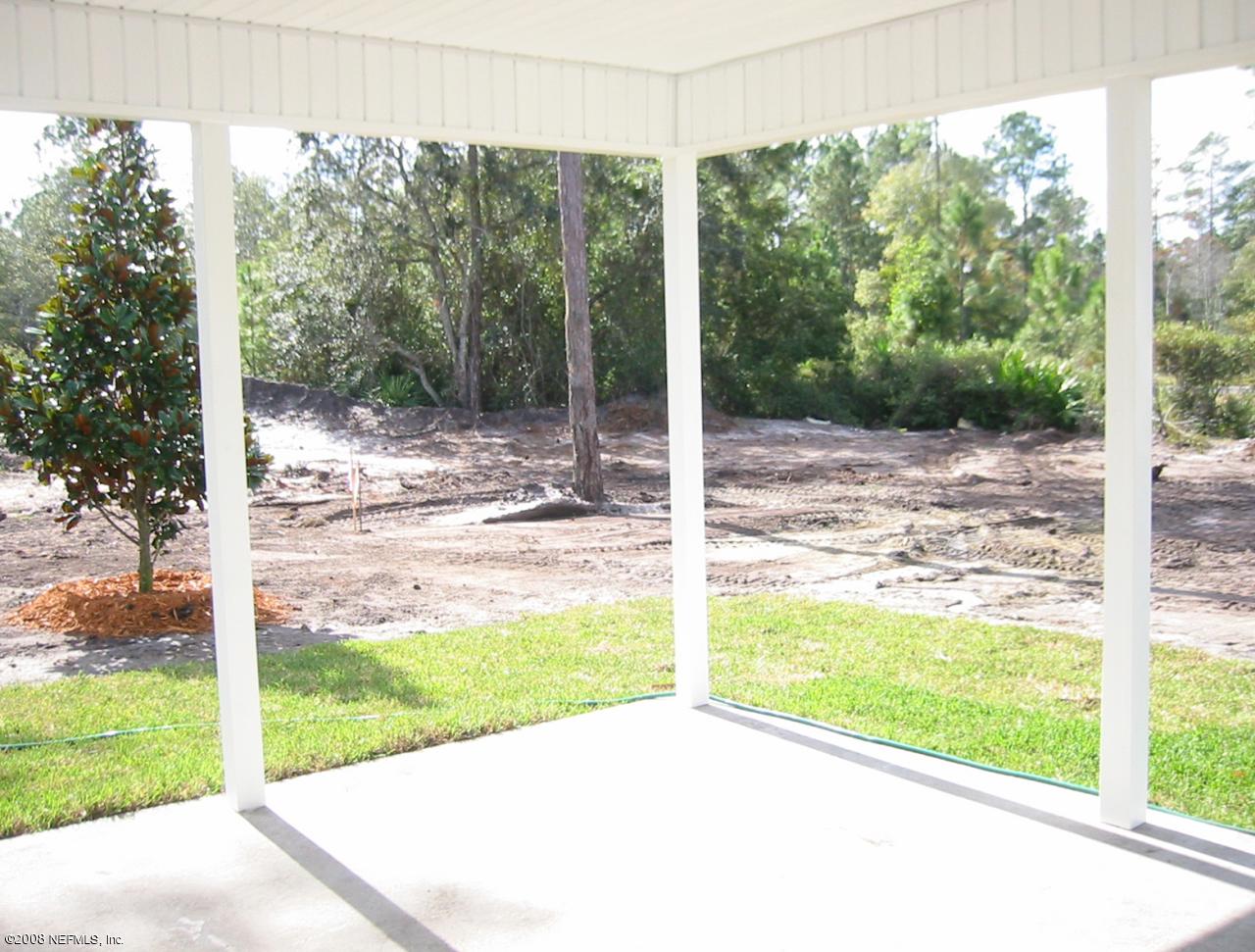 369 North Twin Maple Road St. Augustine, FL 32084 - Photo 8 of 9 a view of a room with porch and a patio