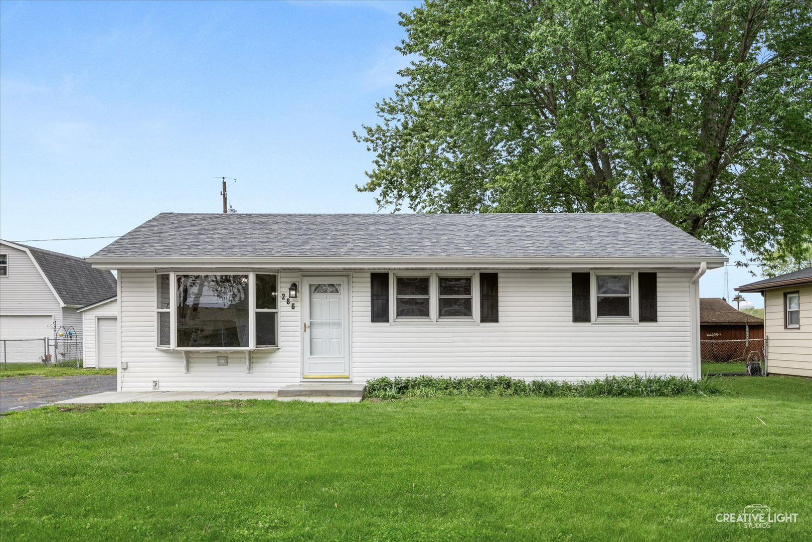 a house that is sitting in front of a house