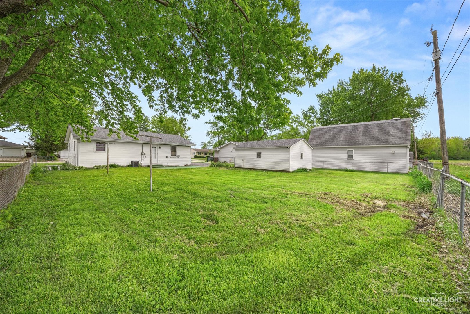 286 South Barbara Drive Kankakee, IL 60901 - Photo 17 of 18 a house view with a sitting space and garden