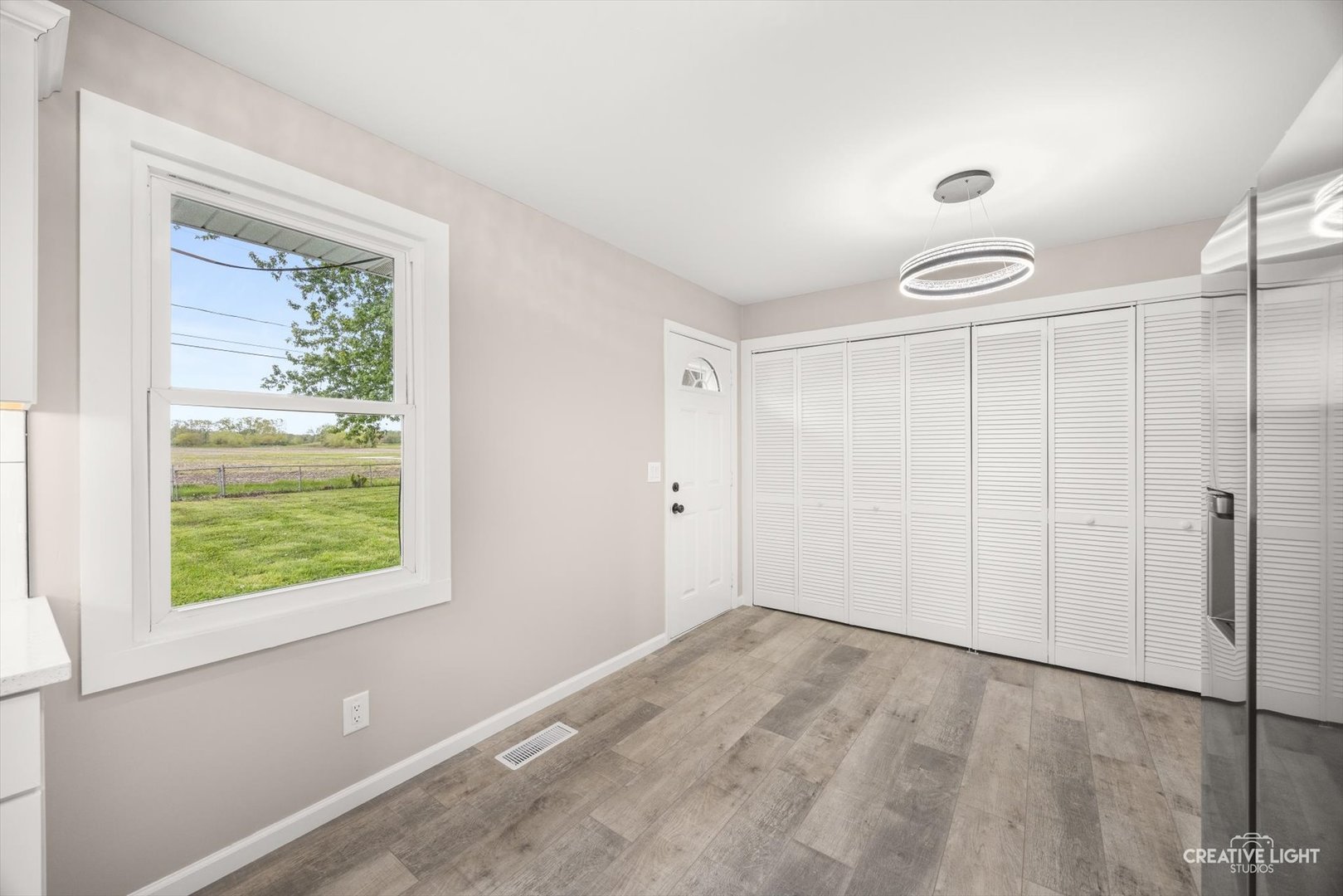 286 South Barbara Drive Kankakee, IL 60901 - Photo 7 of 18 a view of an empty room with a window